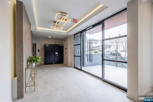 a view of an entryway and livingroom