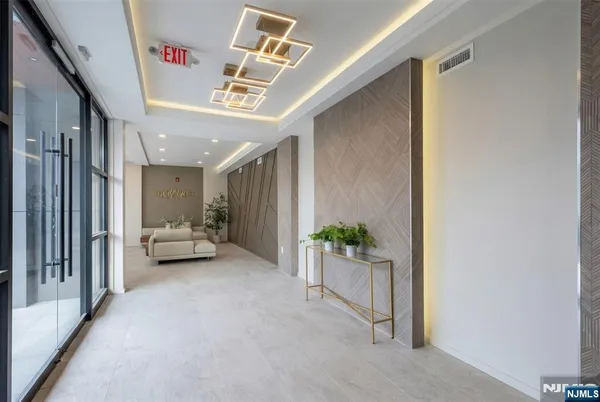 a front view of a building with glass windows