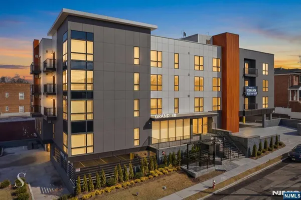 a front view of a building with street view