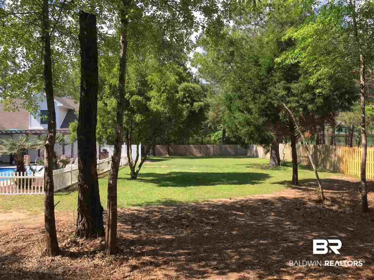 4532 Millhouse Road Gulf Shores, AL 36542 - Photo 37 of 43 Fenced Backyard