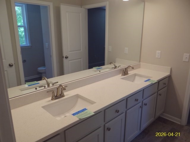 13733 Macon Road Upatoi, GA 31829 - Photo 24 of 27 a bathroom with a sink and a mirror