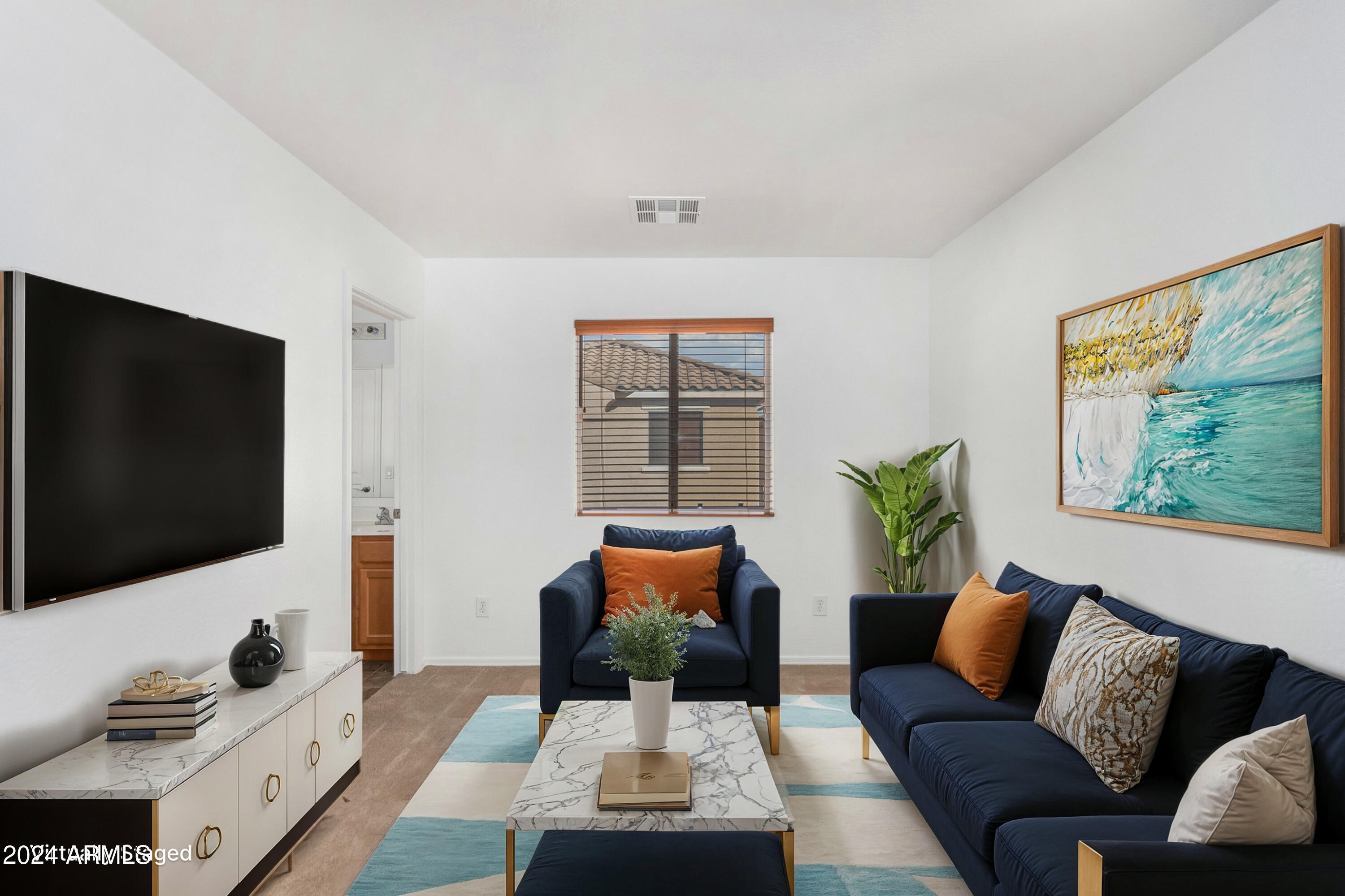 451 South Hawes Road, Unit 68 Mesa, AZ 85208 - Photo 12 of 30 a living room with furniture and a flat screen tv