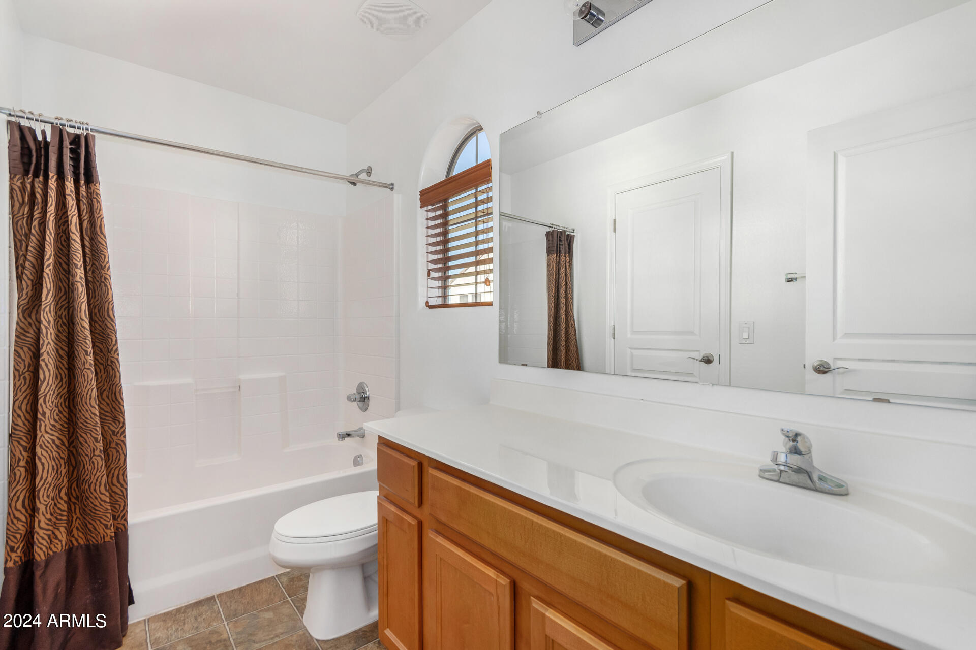 451 South Hawes Road, Unit 68 Mesa, AZ 85208 - Photo 13 of 30 a bathroom with a sink a toilet and a bathtub