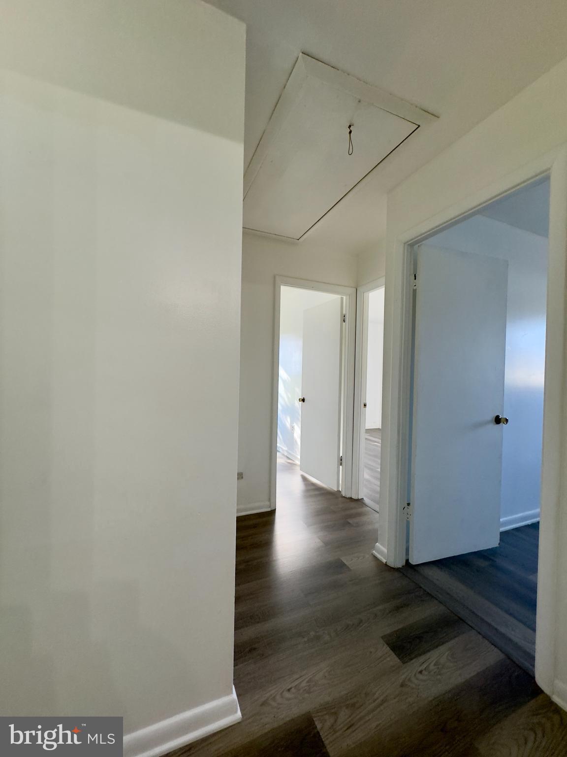 8 King Henry Circle Baltimore, MD 21237 - Photo 6 of 10 a view of a hallway with wooden floor