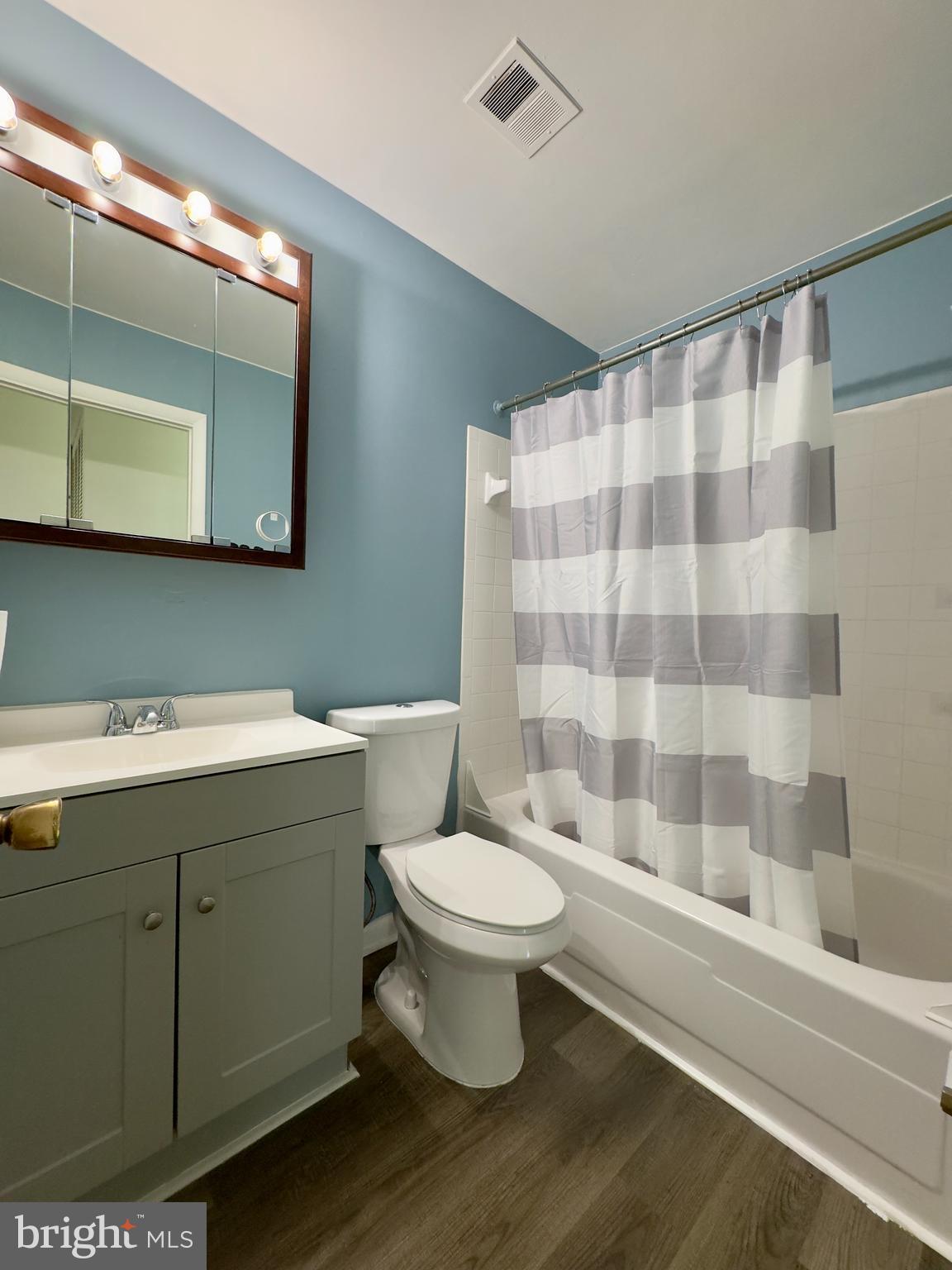 8 King Henry Circle Baltimore, MD 21237 - Photo 7 of 10 a bathroom with a sink toilet and shower