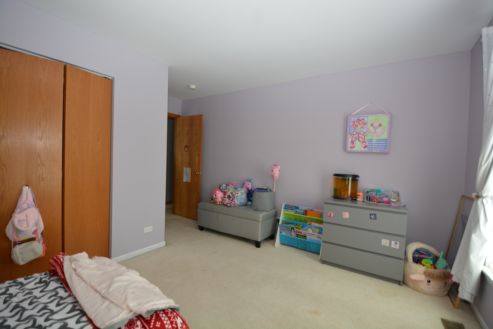 1699 Kautz Road Aurora, IL 60504 - Photo 14 of 19 a bedroom with furniture and a potted plant