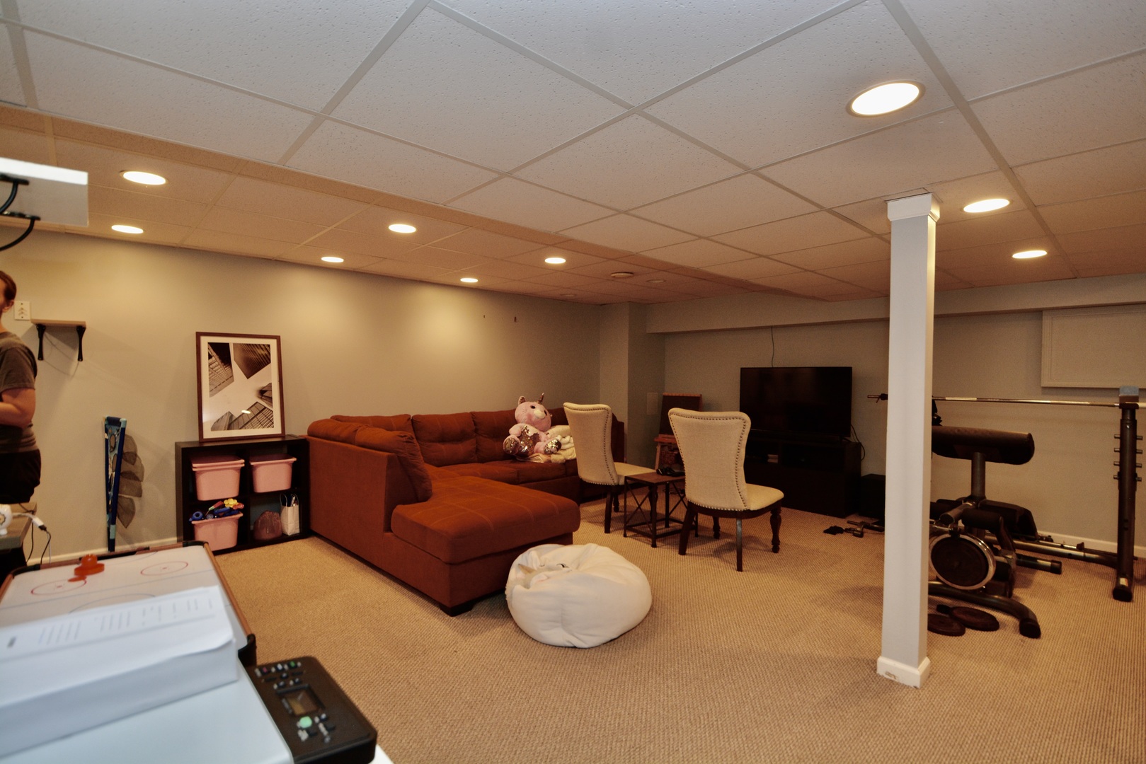 1699 Kautz Road Aurora, IL 60504 - Photo 16 of 19 a living room with furniture and a flat screen tv
