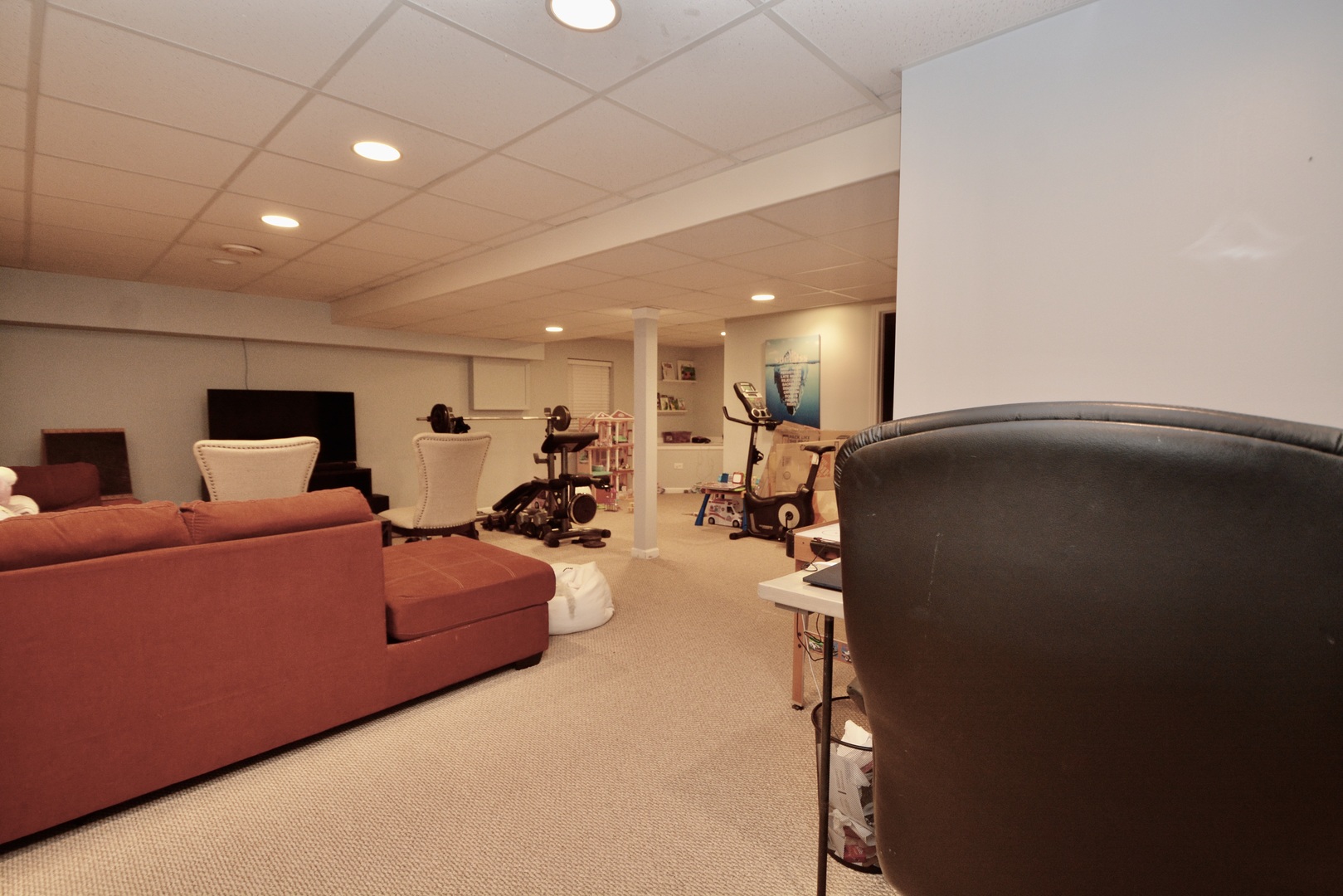 1699 Kautz Road Aurora, IL 60504 - Photo 17 of 19 a living room with furniture a table and chairs