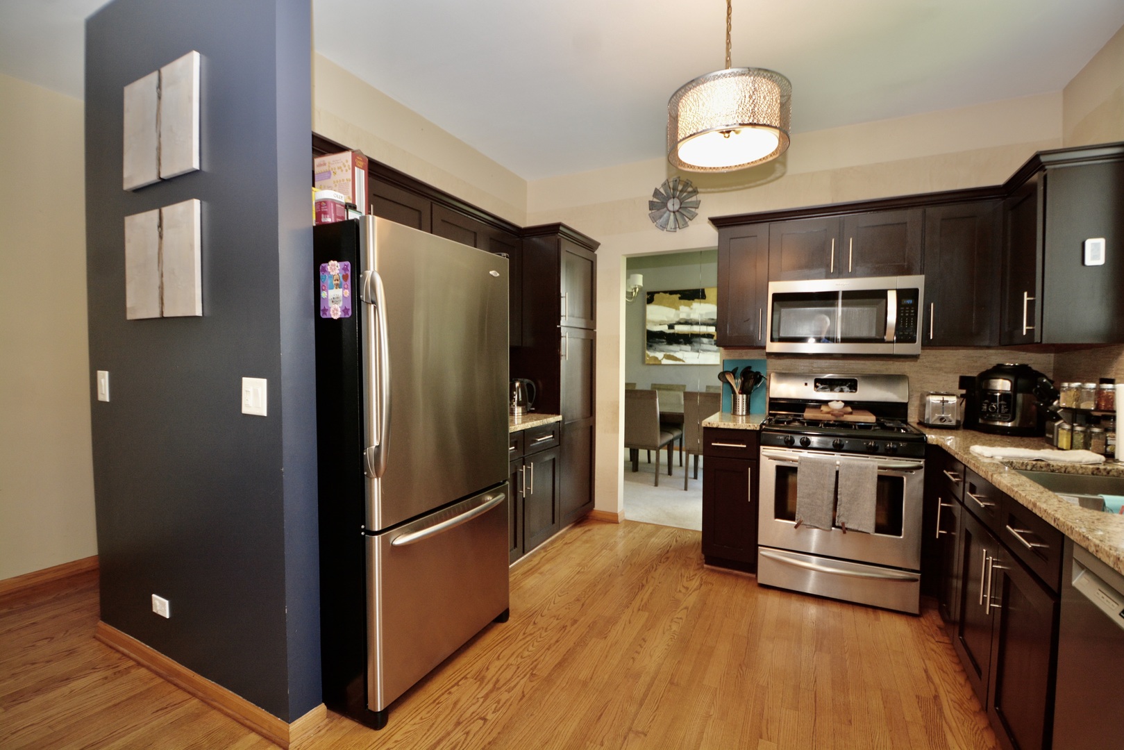 1699 Kautz Road Aurora, IL 60504 - Photo 6 of 19 a kitchen with stainless steel appliances granite countertop a refrigerator a stove top oven a sink and dishwasher