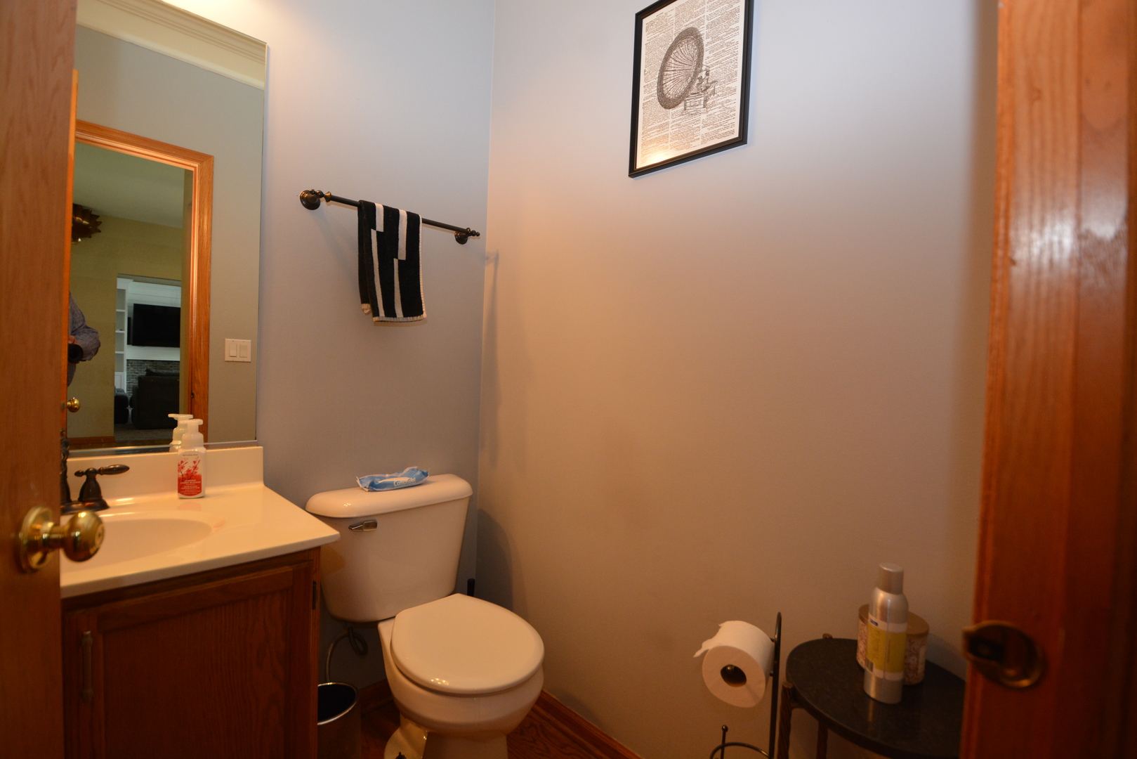 1699 Kautz Road Aurora, IL 60504 - Photo 9 of 19 a bathroom with a toilet a sink and mirror