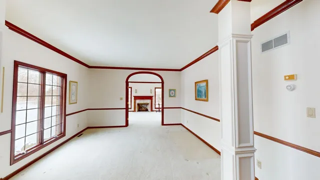 a view of a hallway with washer and dryer