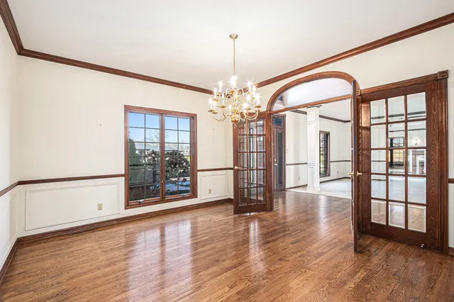a view of hall way with furniture and a fireplace