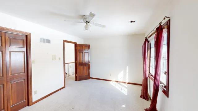 a bathroom with a granite countertop sink and a mirror a bathtub