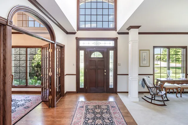 a view of a livingroom with furniture and window