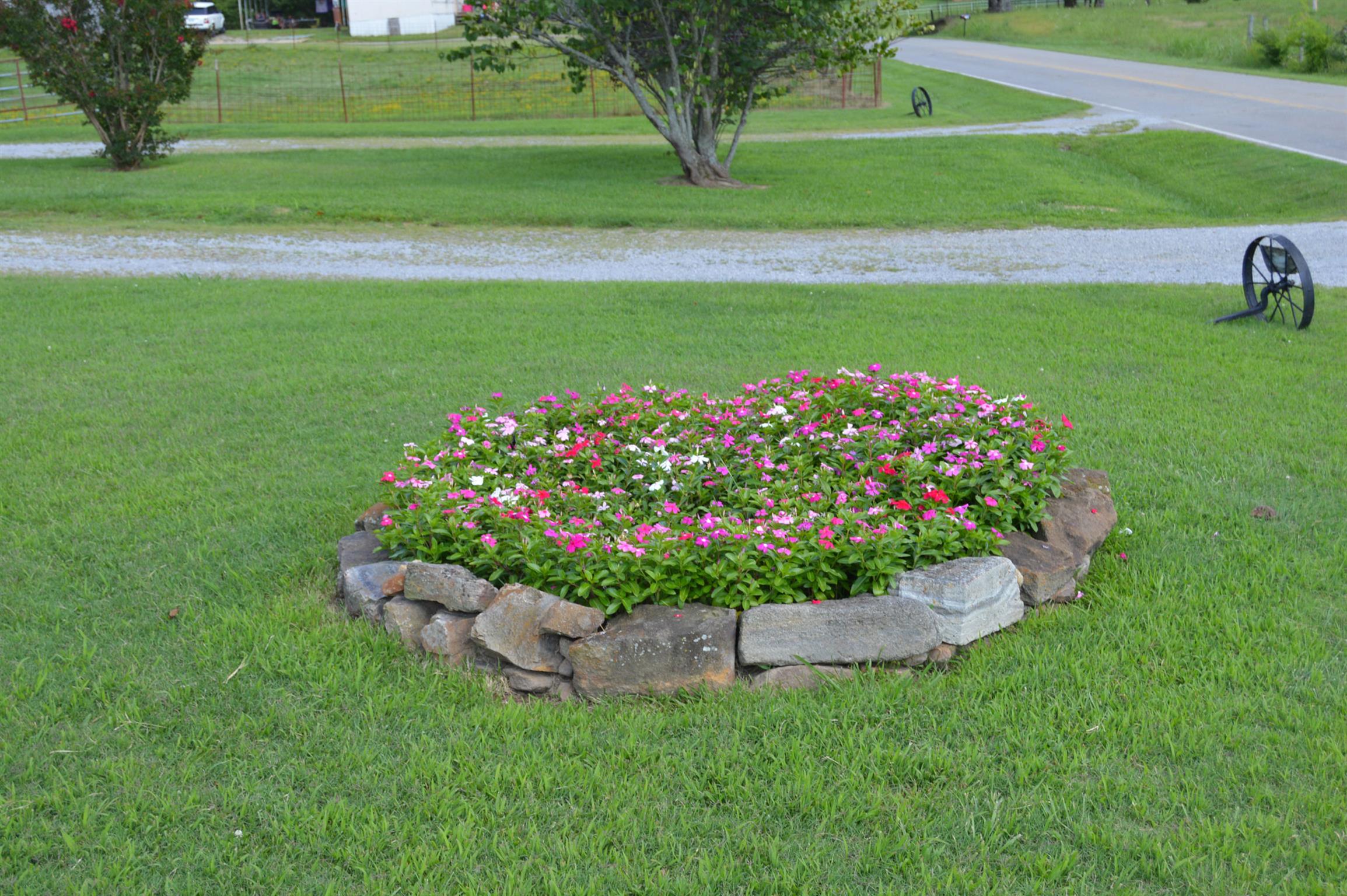 1434 Old Stewart Road Tennessee Ridge, TN 37178 - Photo 19 of 21 a view of a garden with a fountain