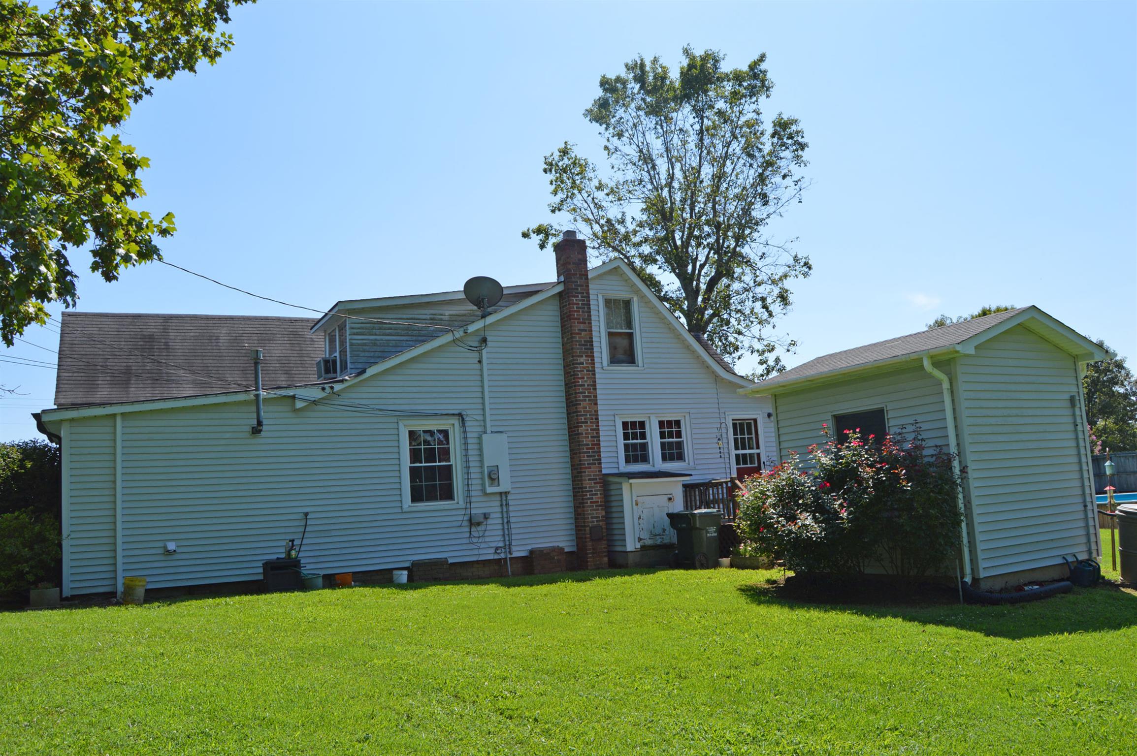 1434 Old Stewart Road Tennessee Ridge, TN 37178 - Photo 2 of 21 a view of a back yard of the house