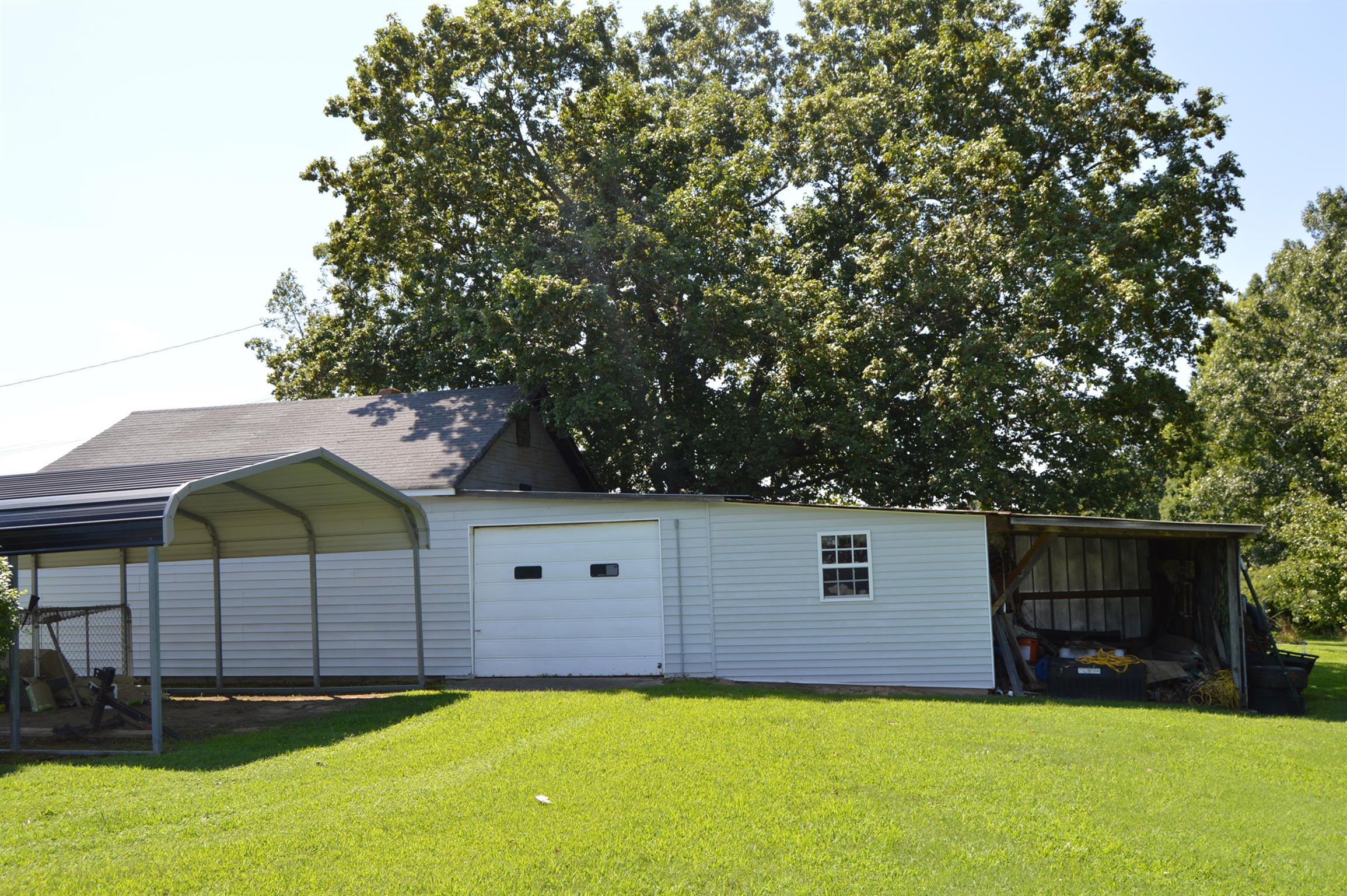 1434 Old Stewart Road Tennessee Ridge, TN 37178 - Photo 7 of 21 a view of a house with a yard