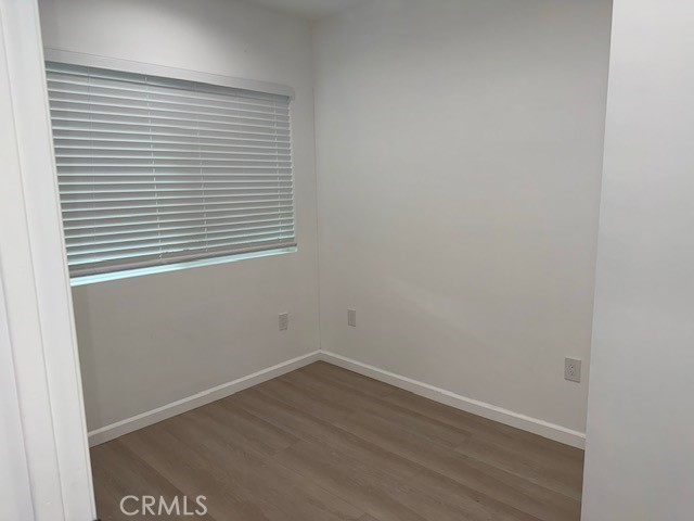 18415 Tuba Street Northridge, CA 91325 - Photo 16 of 21 a view of a small space with wooden floor and a window