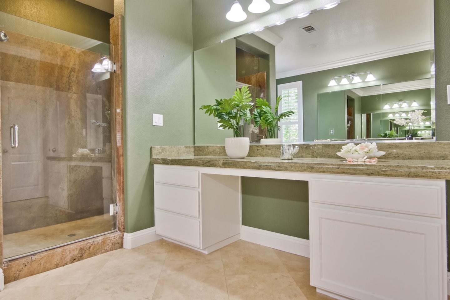 801 Pipers Brook Court San Ramon, CA 94582 - Photo 46 of 78 a bathroom with a sink and shower
