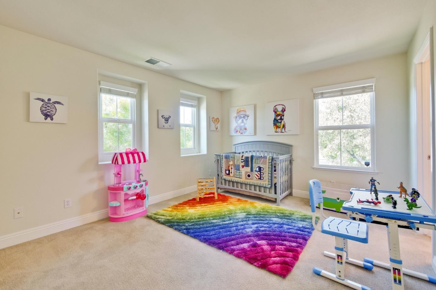801 Pipers Brook Court San Ramon, CA 94582 - Photo 50 of 78 a room that has a bed and a table in it