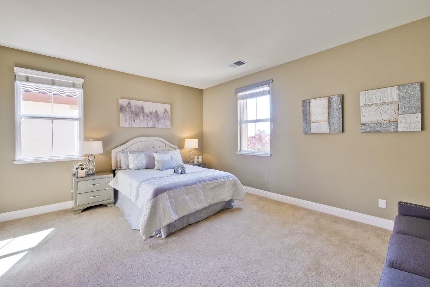 801 Pipers Brook Court San Ramon, CA 94582 - Photo 53 of 78 a spacious bedroom with a bed and a window
