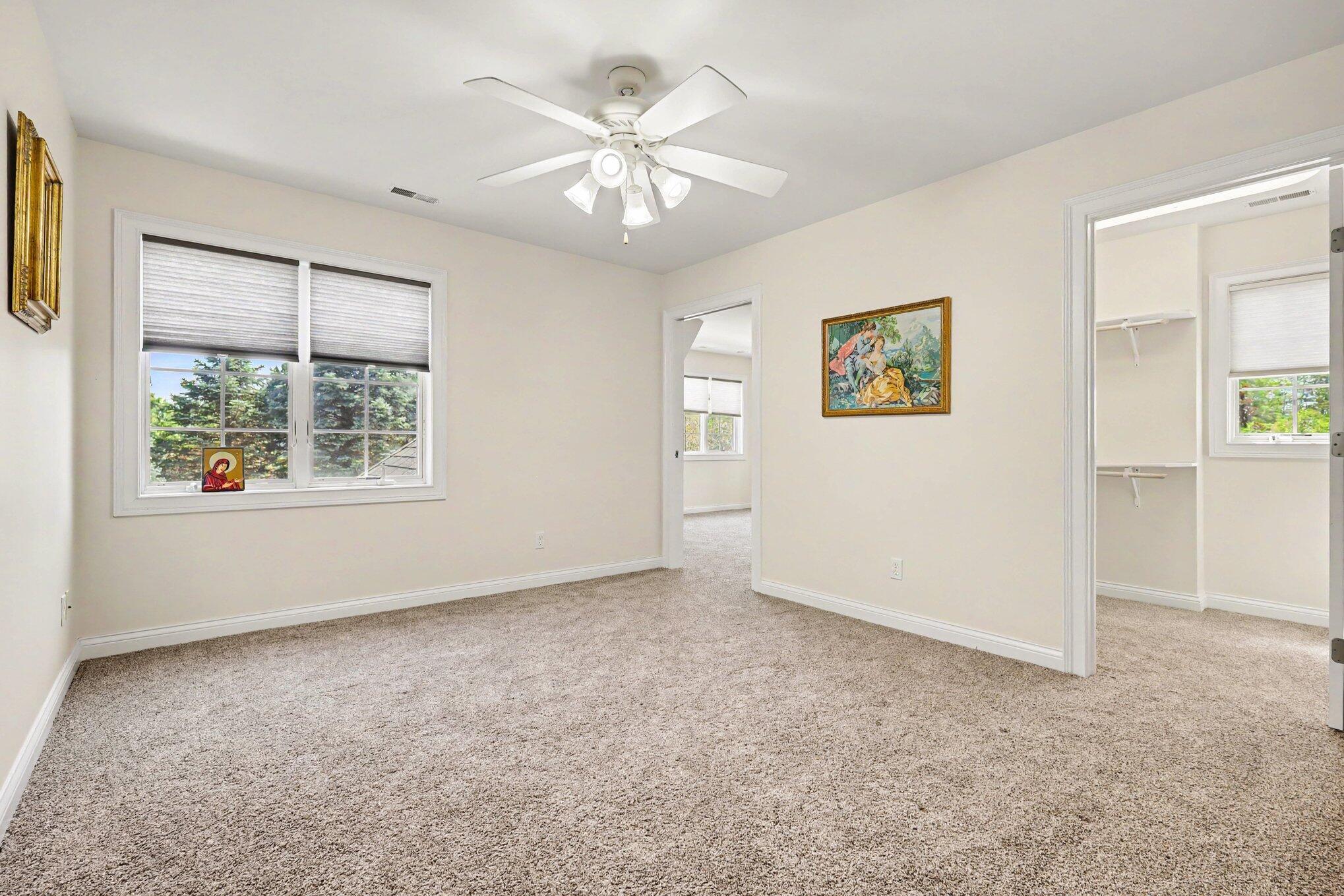 10195 Floyd Street Crown Point, IN 46307 - Photo 14 of 20 wooden floor in an empty room with a window
