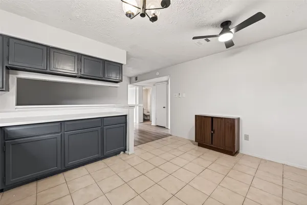 a bathroom with a sink a toilet and vanity