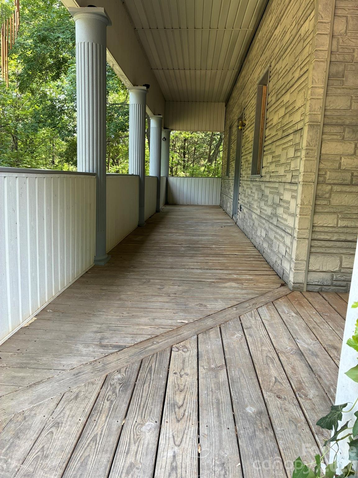2051 Sutton Spring Road York, SC 29745 - Photo 12 of 47 a view of outdoor space with wooden floor and windows