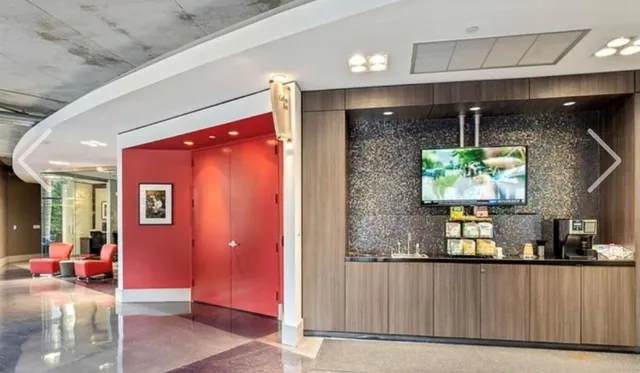 a view of pool with outdoor seating and a patio