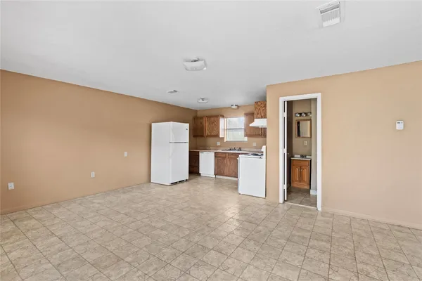 a view of a kitchen with a sink
