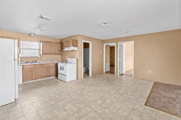 a view of a kitchen with a sink