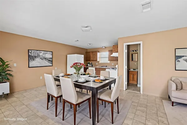 a view of a dining room with furniture