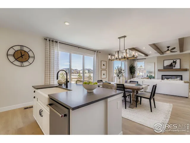a kitchen with a table chairs and a stove