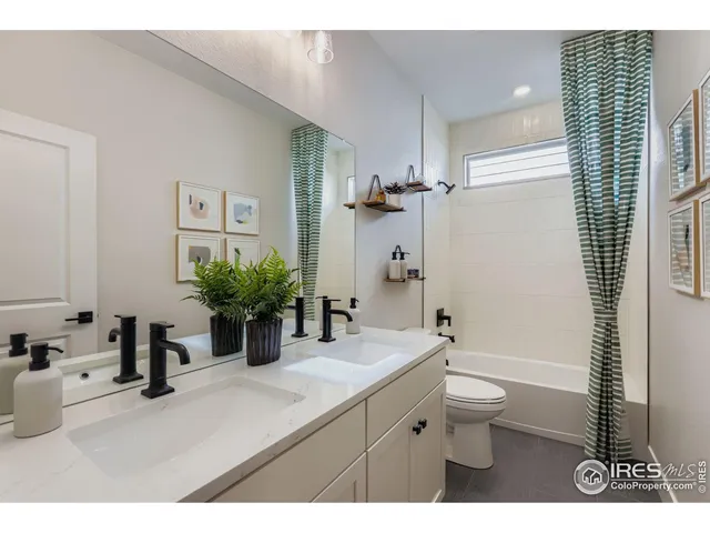 a utility room with cabinets