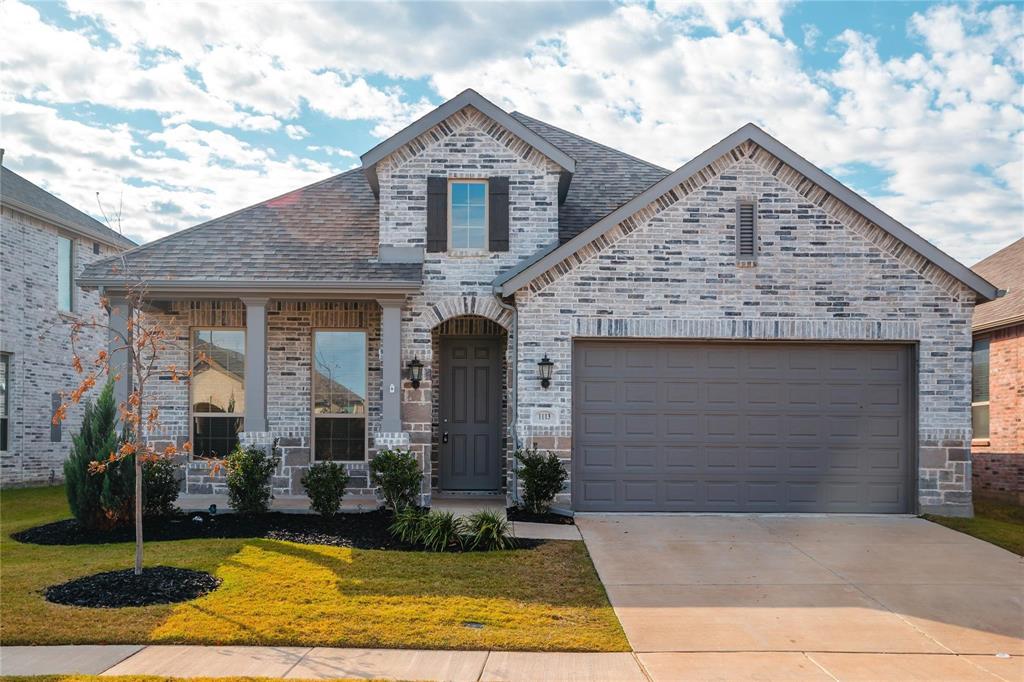 1113 Sheldon Drive Anna, TX 75409 - Photo 1 of 35 a front view of a house with garden