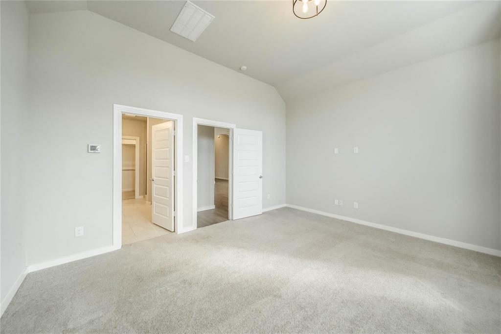 1113 Sheldon Drive Anna, TX 75409 - Photo 23 of 35 a view of an empty room and glass door