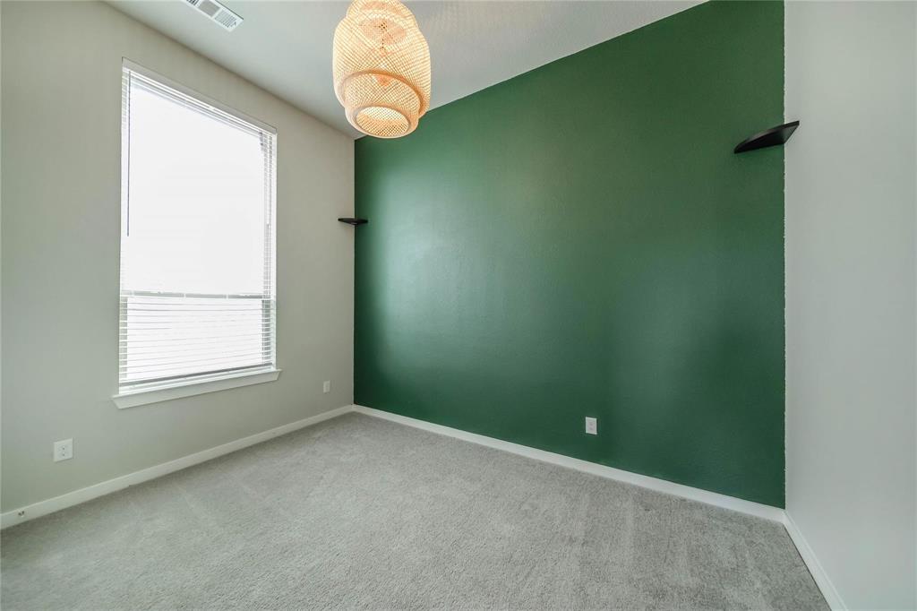 1113 Sheldon Drive Anna, TX 75409 - Photo 30 of 35 an empty room with windows