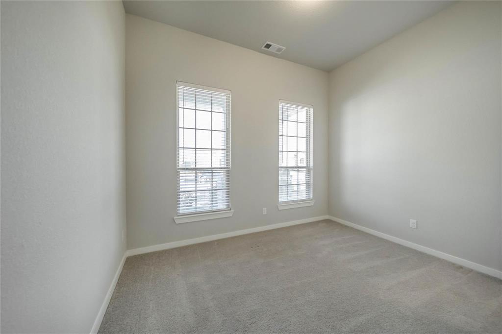 1113 Sheldon Drive Anna, TX 75409 - Photo 3 of 35 an empty room with windows