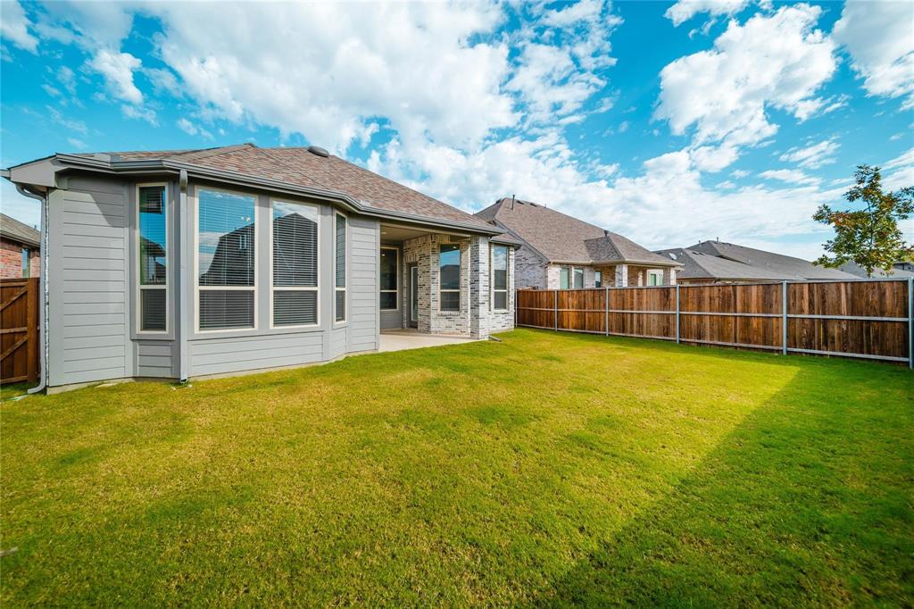 1113 Sheldon Drive Anna, TX 75409 - Photo 31 of 35 a view of a house with a garden