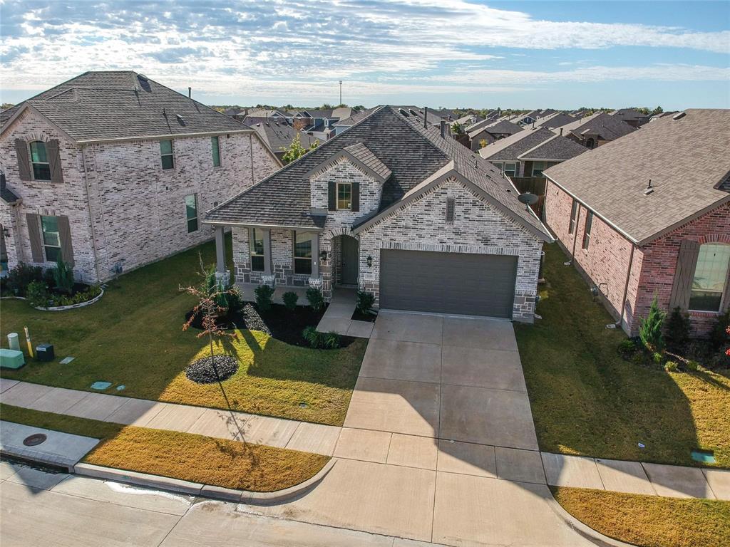 1113 Sheldon Drive Anna, TX 75409 - Photo 35 of 35 a front view of a house with a yard