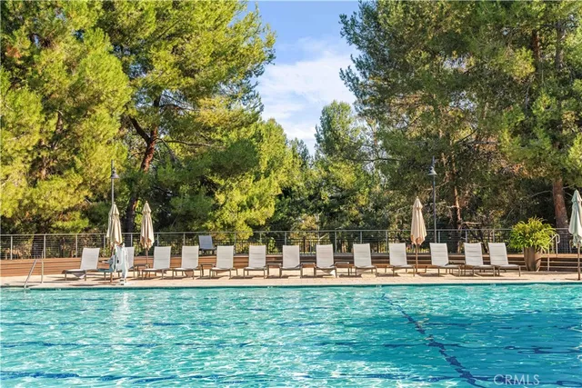 a view of a park with swings and slides