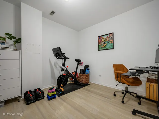a view of a workspace with gym equipment