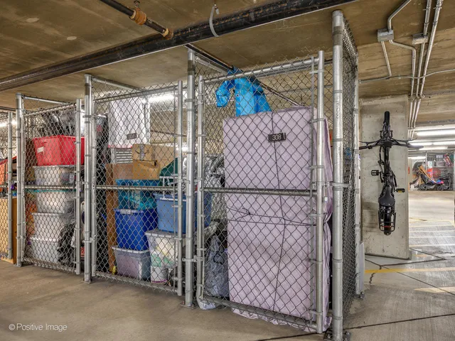 a view of parking garage with cars