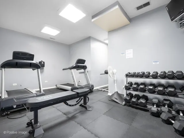 a view of a room with gym equipment