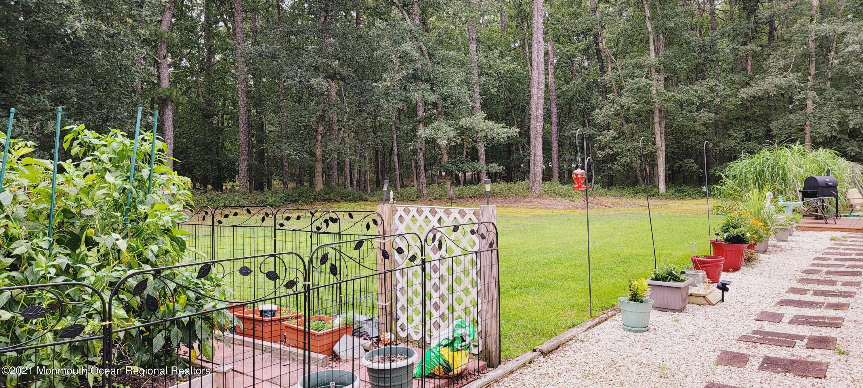 419 Stage Road Little Egg Harbor, NJ 08087 - Photo 5 of 15 walk-way to rear yard