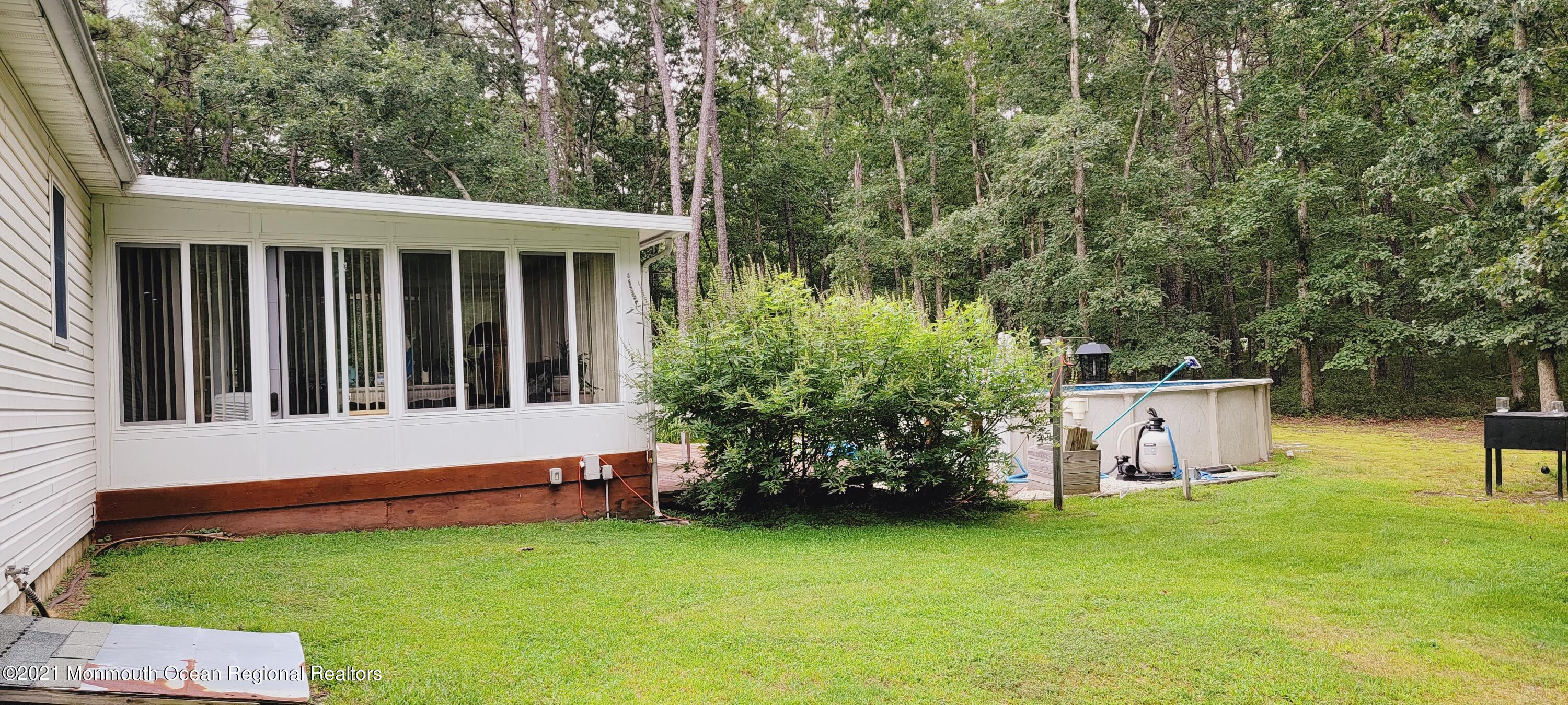 419 Stage Road Little Egg Harbor, NJ 08087 - Photo 6 of 15 rear addition four seasons room