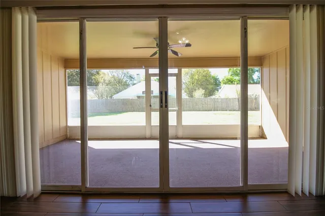 a view of living room with a large window