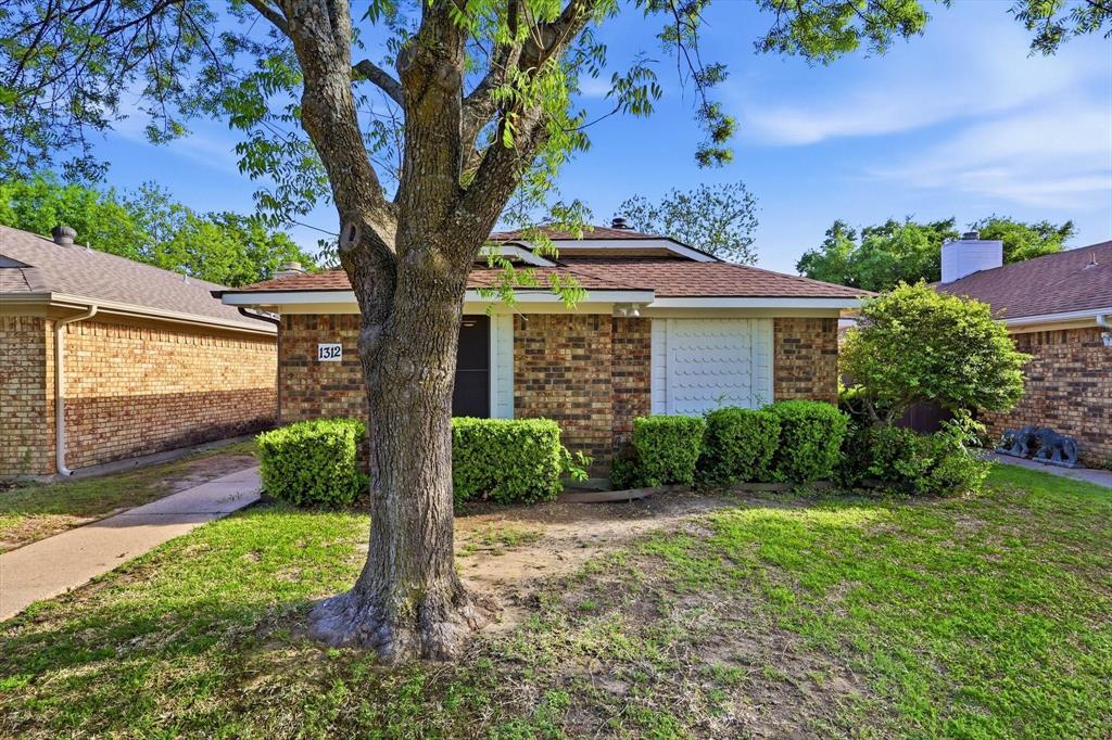 1312 Hackamore Street Mesquite, TX 75149 - Photo 22 of 23 Ranch-style house featuring a front lawn