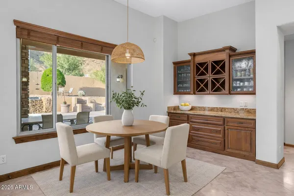 a living room with furniture or outdoor view and a chandelier