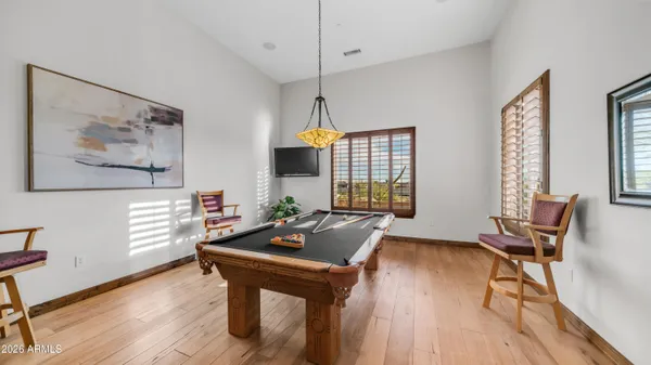 a kitchen with stainless steel appliances wooden cabinets and a stove top oven